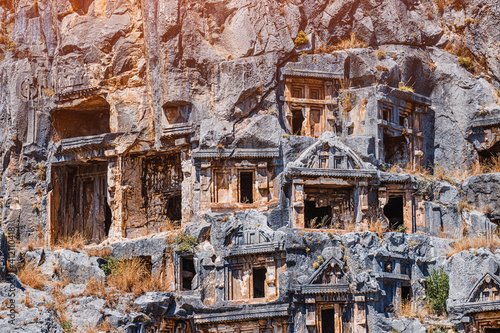 Ancient city of Myra in Turkey is a popular historical landmark that attracts numerous excursions and tourists every day. Tombs are carved right into rock