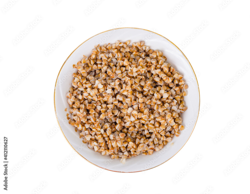 Boiled buckwheat, Russian porridge in white plate Boiled buckwheat, Russian porridge in white plate