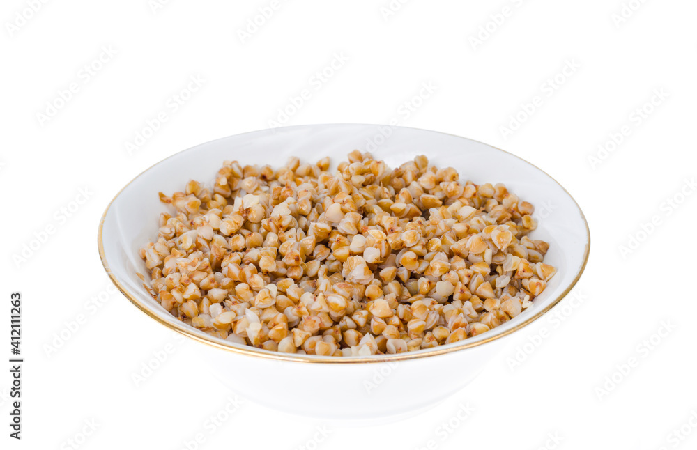 Boiled buckwheat, Russian porridge in white plate Boiled buckwheat, Russian porridge in white plate