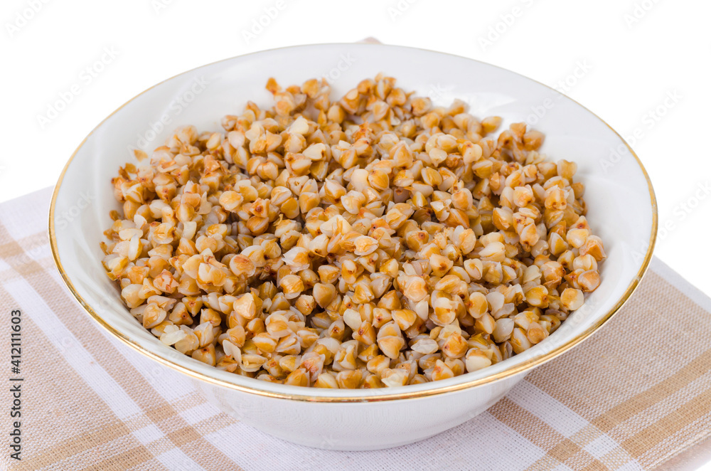 Boiled buckwheat, Russian porridge in white plate Boiled buckwheat, Russian porridge in white plate