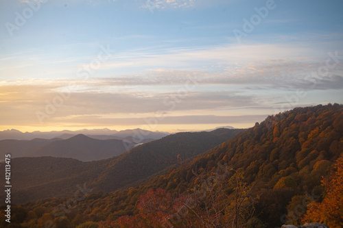Scenic view of Mountains against sky during sunrise. Majestic sunrise over the mountains