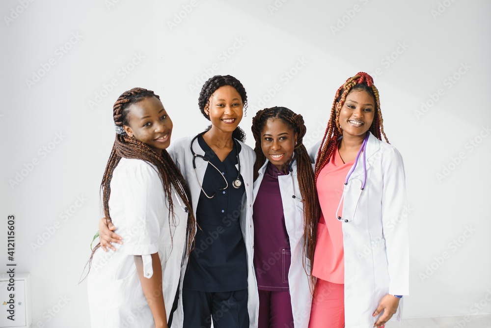 group of young african medical workers on white background group of young african medical workers on white background