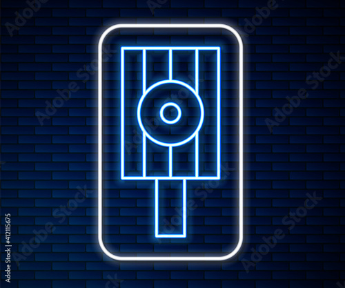 Glowing neon line Spray can nozzle cap icon isolated on brick wall background. Vector.