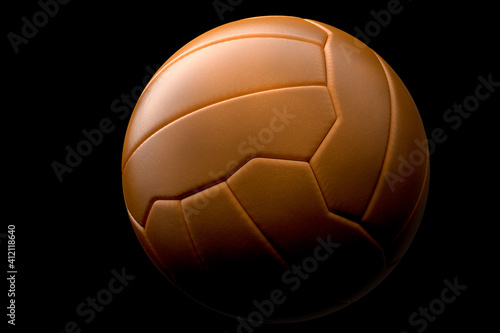 Leather handball ball or football on black background