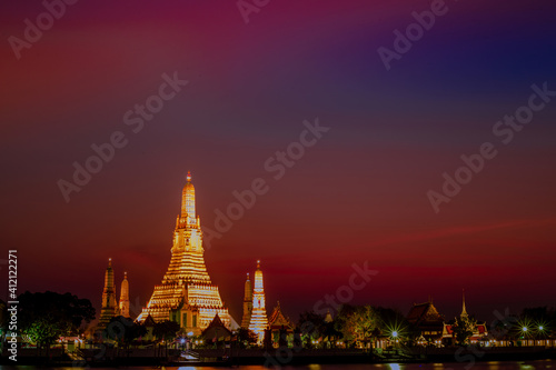 Blurred abstract background of the pagoda scenery of Wat Arun on the Chao Phraya River in Bangkok of Thailand  the silhouette  the light hitting the sculpture  has a kind of artistic beauty.