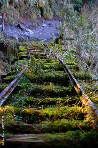 Abandoned railway tracks (Jianqing Huaigu Trai) at Taipingshan National Forest Recreation Area in Yilan, Taiwan photo