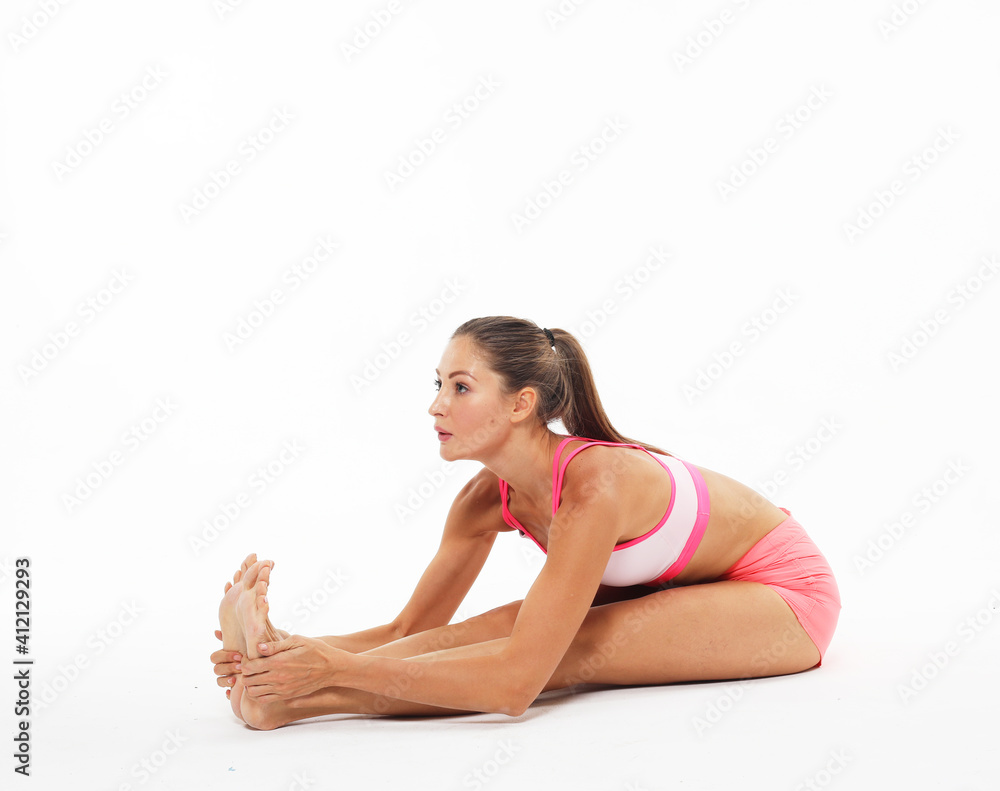 Yoga and sport concept - Beautiful young woman doing yoga, isolated on white background Yoga and sport concept - Beautiful young woman doing yoga, isolated on white background