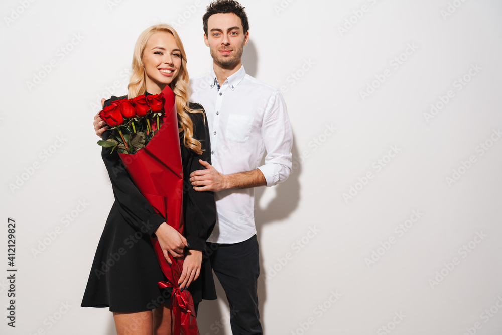 Lovely romantic young happy couple celebrating