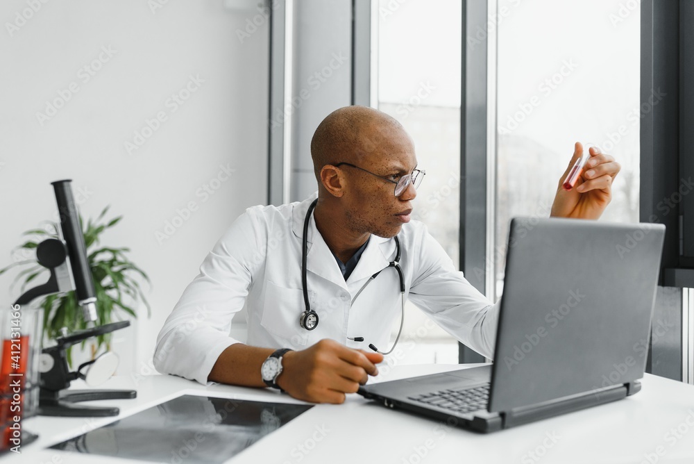 Fototapeta premium young male african doctor in hospital