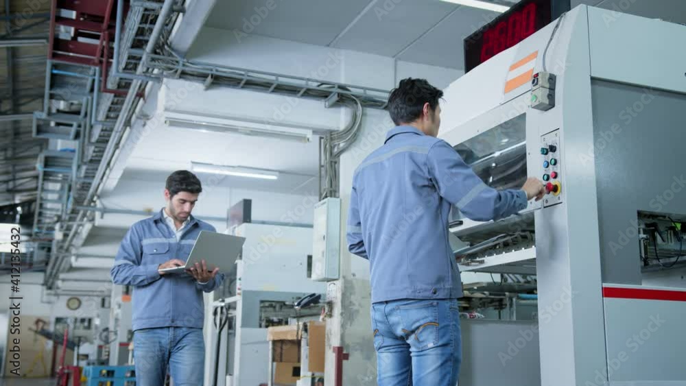 specialist worker engineer team control and operate printing package lable machine with computer screen with concentrate and focus industrial factory machinery ideas concept specialist worker engineer team control and operate printing package lable machine with computer screen with concentrate and focus industrial factory machinery ideas concept