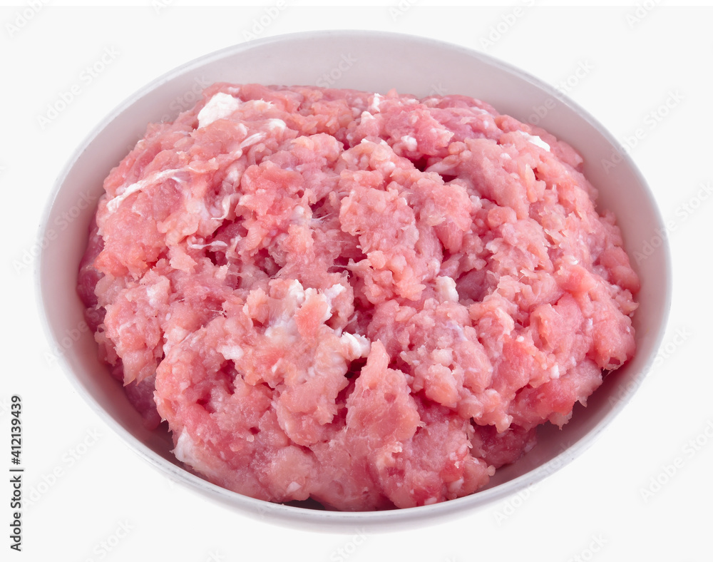 Raw fresh minced pork meat in white bowl isolated on white background Raw fresh minced pork meat in white bowl isolated on white background