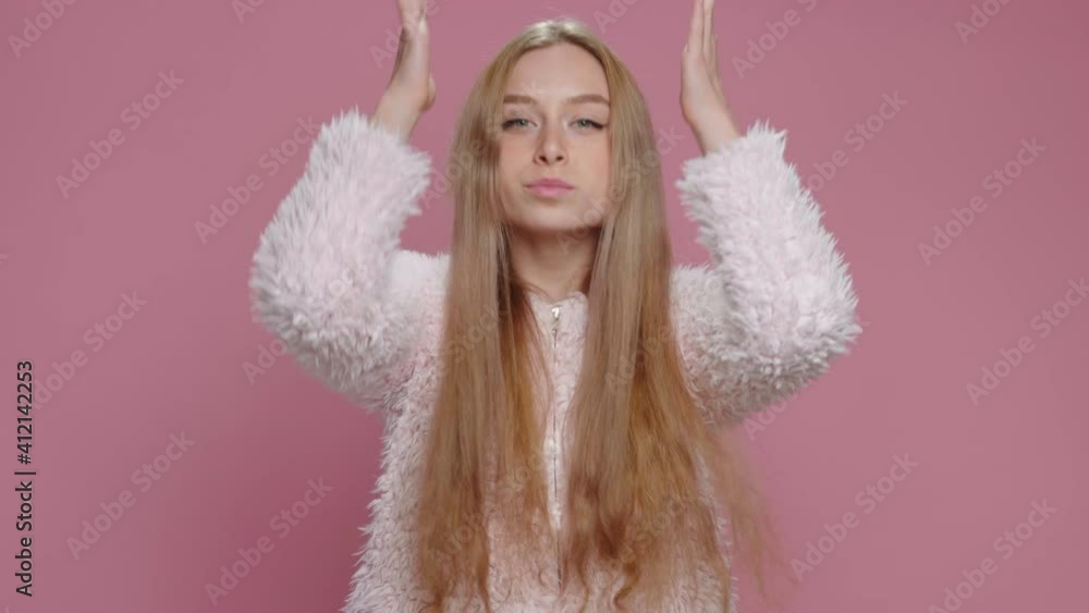 Dancing Young girl with Long Blonde Hair Makes Square in Front of Face with Hands to Music Smile Pink Background. Funny Dances Happy Teen girl. Fashion. Glamour. Positive Emotions People. Freedom Dancing Young girl with Long Blonde Hair Makes Square in Front of Face with Hands to Music Smile Pink Background. Funny Dances Happy Teen girl. Fashion. Glamour. Positive Emotions People. Freedom