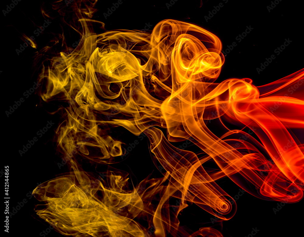 Colored smoke on black background Colored smoke on black background