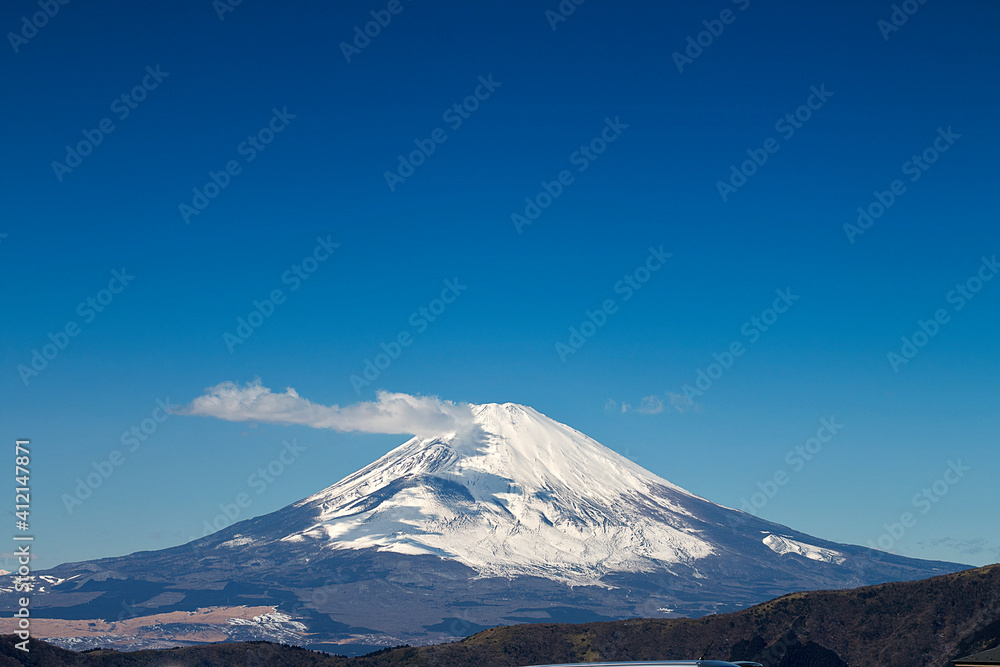 Close up famous view of Fuji mountain with snow cover on the top with could, Japan