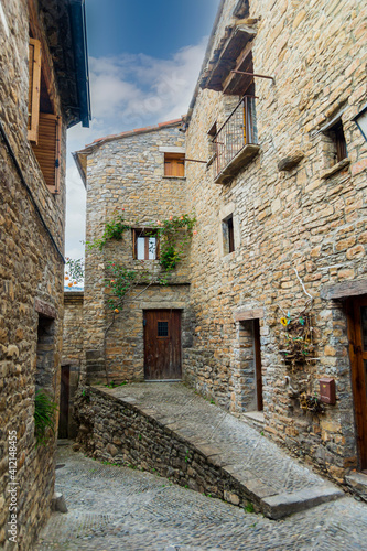 urban and picturesque landscape with cobblestone streets and rural houses of Ainsa located in Huesca province of Aragon, Spain.