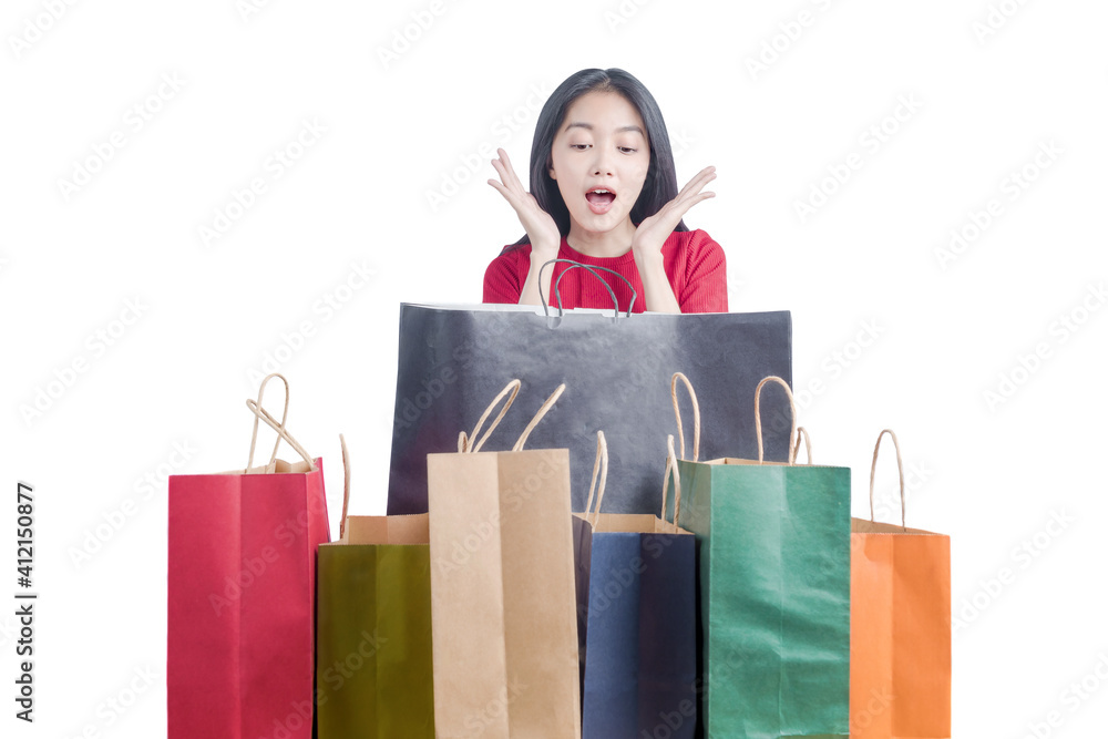 Asian woman shocked with so many shopping bags Asian woman shocked with so many shopping bags