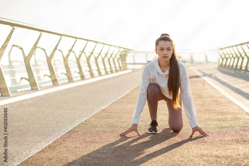Fototapeta premium Confident woman is ready to run