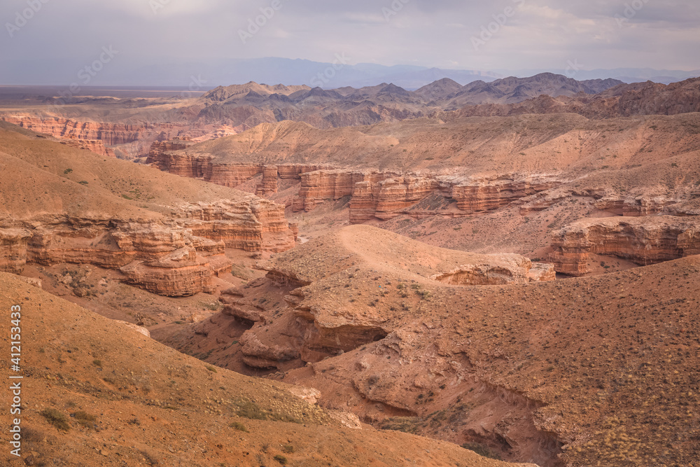 Rugged badlands landscape and terrain of Charyn Canyon National Park in the Almaty Province of Kazakhstan. Rugged badlands landscape and terrain of Charyn Canyon National Park in the Almaty Province of Kazakhstan.