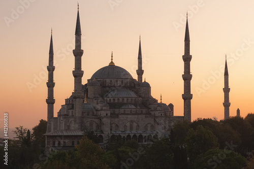 The iconic Ottoman-era Blue Mosque at Sultanahmet in Fatih, Istanbul, Turkey at sunset or sunrise.