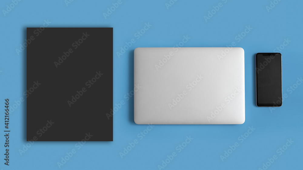 Dark blank sheet. Laptop on a blue background. Dark blank sheet. Laptop on a blue background.