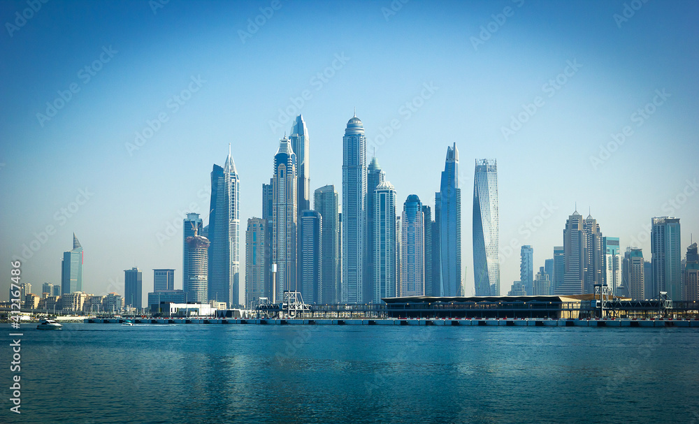tall buildings on the Dubai Marina on the shore of the Persian Gulf