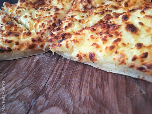 Traditional Adjarian Georgian khachapuri with cheese.