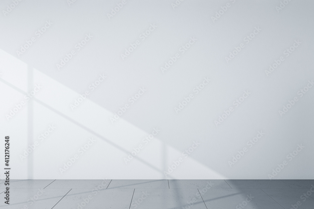 Front view on blank light grey wall in the morning and grey floor. Mockup. 3D rendering Front view on blank light grey wall in the morning and grey floor. Mockup. 3D rendering