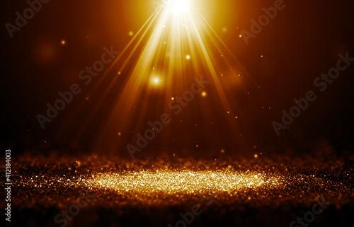 Gold and Yellow color sparkle rays glitter lights with spotlight bokeh elegant show on stage abstract background. Dust sparks background.Spotlight background