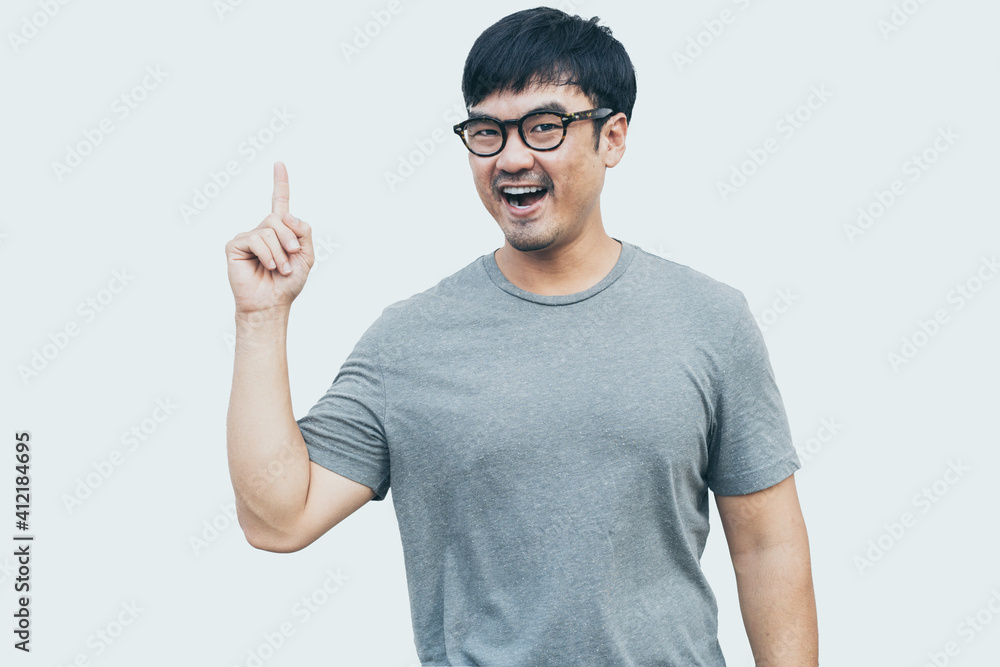 Naklejka premium adult asian man.young male person wear eye glasses.posing smiling laughing look excited surprised thinking positive happy.empty,copy space for text advertising.white background.attractive fashion