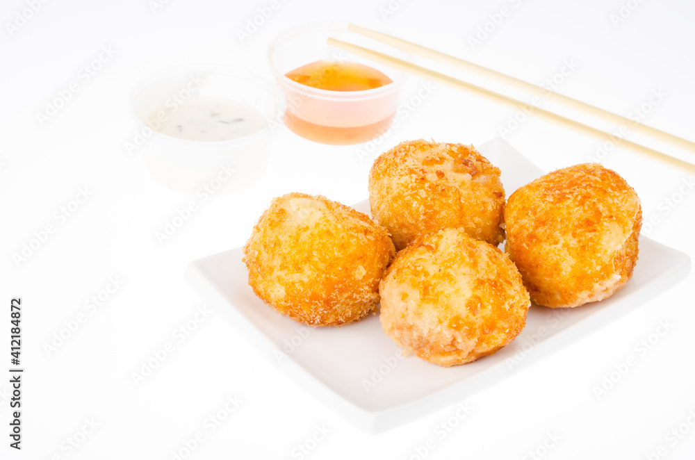 Cheese balls with chicken and mozzarella in batter and breadcrumbs Cheese balls with chicken and mozzarella in batter and breadcrumbs