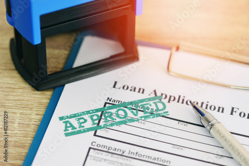 Obraz na plátne Loan approval, Loan application form with Rubber stamping that says Loan Approved, Financial loan money contract agreement company credit or person