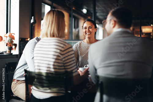 Businesspeople talking during their coffee break