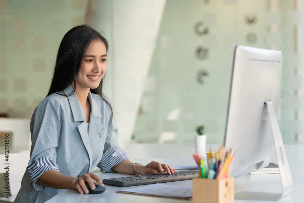 Portrait of businesswoman working with computer device in the office room. Portrait of businesswoman working with computer device in the office room.