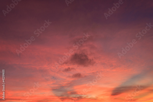 Sunset sky in the evening on twilight with colorful sunlight, Dusk sky background. © Nature Peaceful 