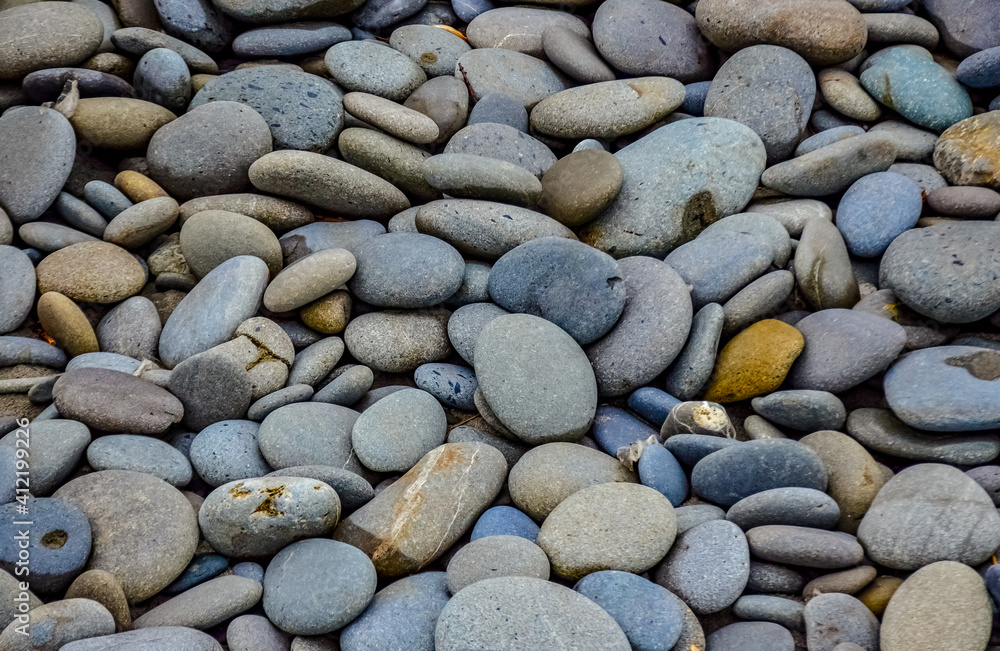 Multicolored round pebble stones on the Pacific Ocean in Olympic National Park, Washington Multicolored round pebble stones on the Pacific Ocean in Olympic National Park, Washington