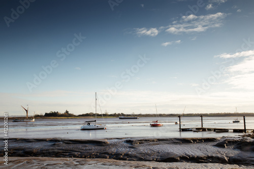 boats sitting on mud