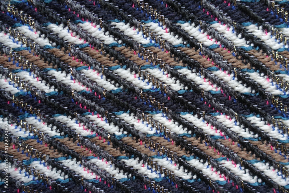 Texture of multicolored tweed fabric with lurex Texture of multicolored tweed fabric with lurex