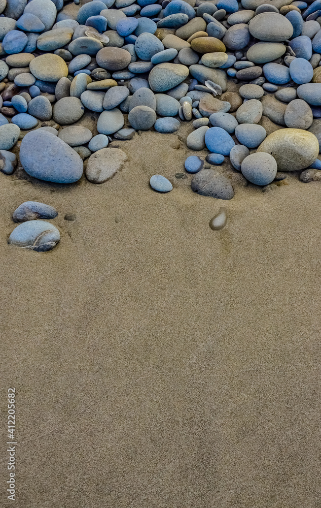 Multicolored round pebble stones on the Pacific Ocean in Olympic National Park, Washington Multicolored round pebble stones on the Pacific Ocean in Olympic National Park, Washington