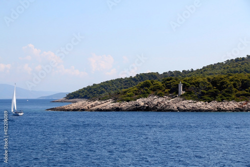 Sailing boat near island in Croatia. Beautiful Mediterranean landscape. © jelena990