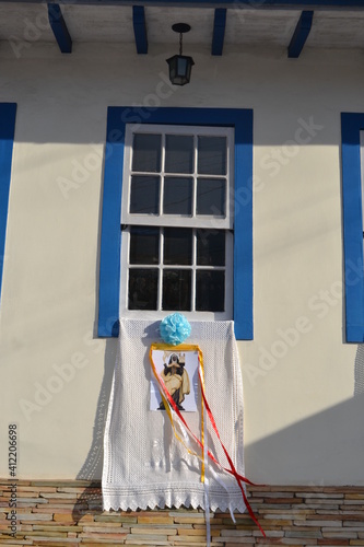 window with a religious flag