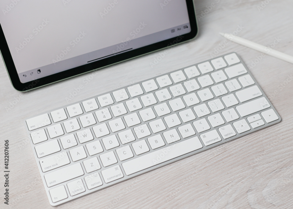 laptop on a wooden table