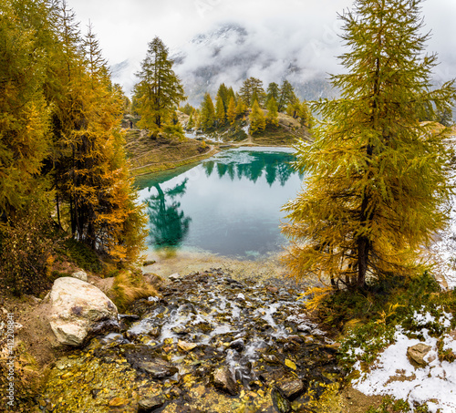 autumn mood over alpine lake in Valais © schame87