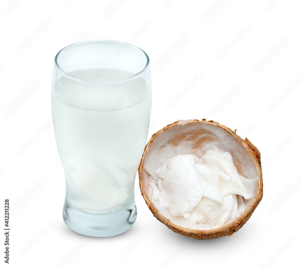coconut flakes and juice in glass cup isolated on white background ,include clipping path coconut flakes and juice in glass cup isolated on white background ,include clipping path