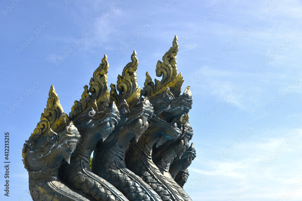 Multi Head Naka Statue Under Blue Sky Multi Head Naka Statue Under Blue Sky