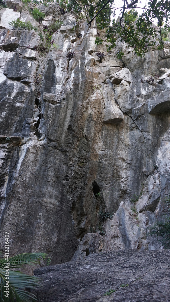 a rock wall on one of the Marble Mountains, Ngu Hanh Son South Da Nang, Vietnam, February