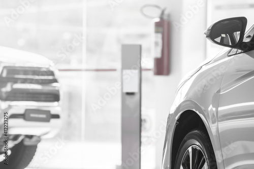 Showroom of cars for sale on shop, concept of a car dealership.