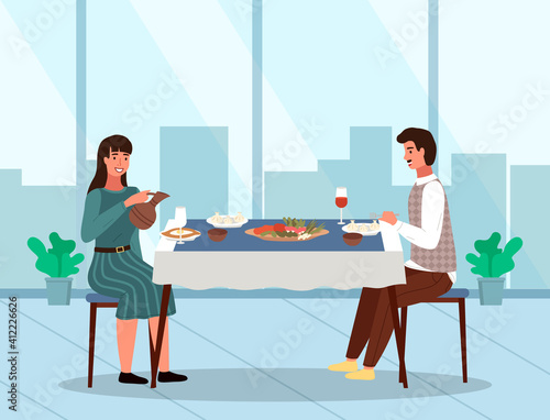 Couple is eating traditional georgian food. People in a relationship on a date in a Georgian restaurant. The mustachioed man is eating khinkali. Woman sitting with Adjarian khachapuri in a plate