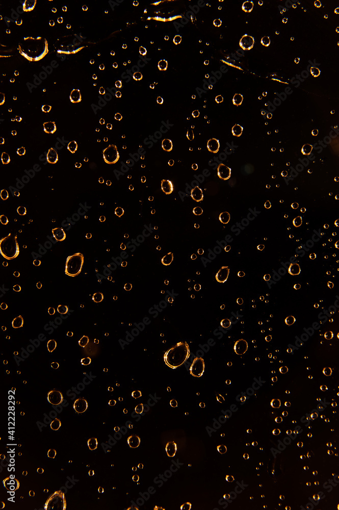 water drops on dark background water drops on dark background