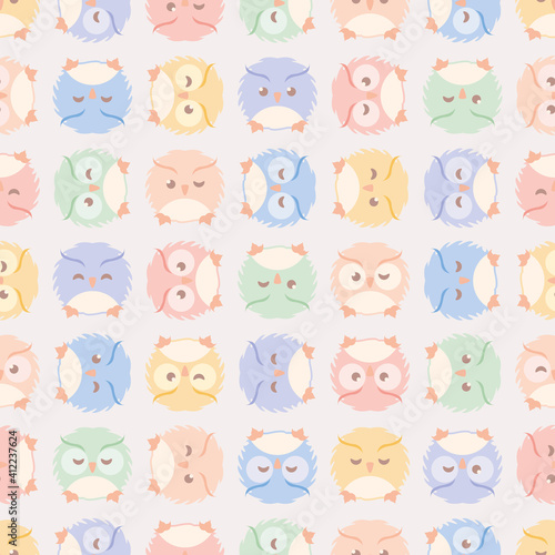 Cute fluffy owls seamless pattern. Soft retro-colored vector illustration for children.