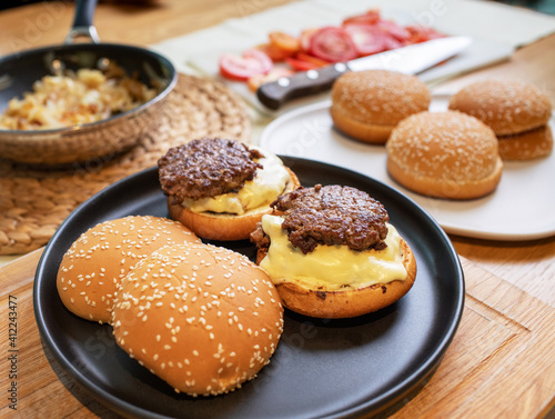 Beef burgers are made from bread, cheese and minced meat. It is a popular and famous fast food menu around the world. It is delicious and easy to cook for breakfast, lunch and dinner.